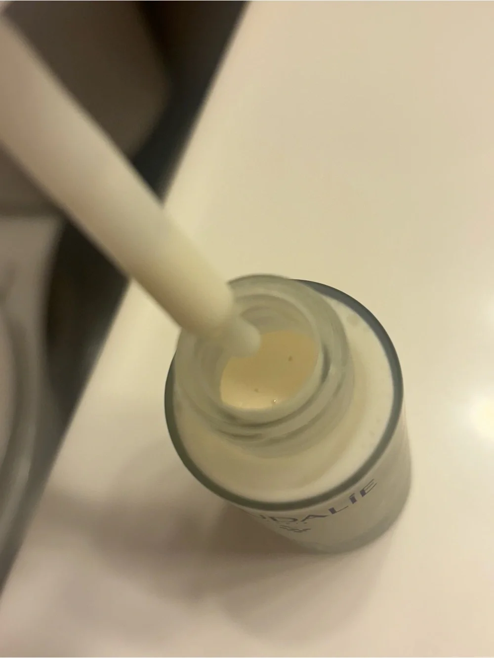 Caudalie Brightening Serum Bottle in White and Blue - Picture 2 of 3